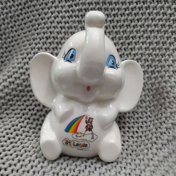 Vintage white ceramic Good Luck elephant bank with rainbow and Arch on its belly - St. Louis travel souvenir c. 1986 MRTC