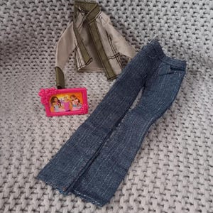 My Scene Barbie Tagged Olive Green Windbreaker with Jeans and a framed picture of her Friends