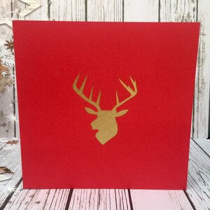 Rendier kerstkaarten en feestuitnodigingen voor de feestdagen verkrijgbaar in verschillende kleuren handgesneden en ontworpen door HKdesign8