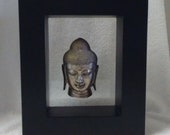 Asian style home decor Buddha head suspended in frame table accent piece Asian, cultural decor. Den, living room, office study
