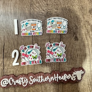 May include: Two sets of colorful stickers with a nurse theme. One set says "Can't talk right now, doing nurse stuff." The other set says "You give me butterflies". The stickers are on a wooden background with a white number 2 and a pink and white sign that says "@Crafty Southern Herfers".