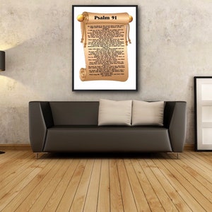 May include: A framed print of Psalm 91, a biblical passage, displayed on a wall in a living room setting. The print features a scroll with gold accents and the text of the psalm.