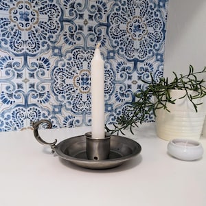 May include: A rustic wooden sign with the text "Welcome to our home" in white lettering. The sign features a distressed finish and a simple, inviting design, perfect for entryway decor.