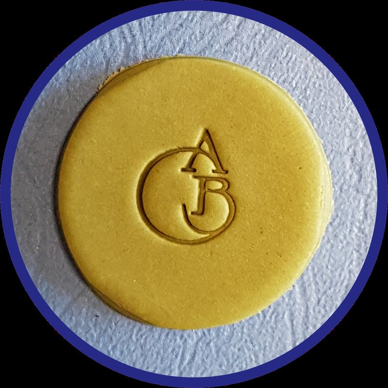This image shows the letters A and B connected together via the flow of the text to give a unique shape to this stamp.  Each stamp is unique to the next, as connecting layout is at my discretion. Sample draft is available after purchase upon request