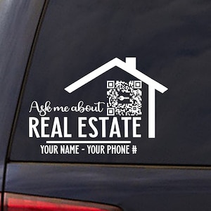 May include: White vinyl sticker with a house icon and a QR code. The text reads "Ask me about REAL ESTATE YOUR NAME - YOUR PHONE #".