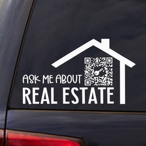 May include: White vinyl sticker with a house icon and a QR code. The text "Ask me about real estate" is below the house icon.