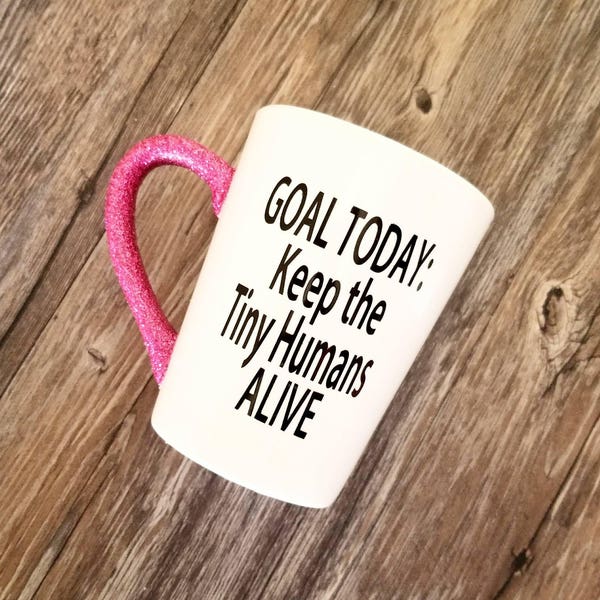 Goal today keep the tiny humans alive, 14oz glitter mug