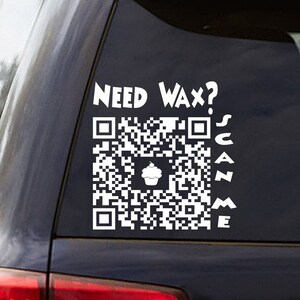 May include: White vinyl sticker with a QR code and the text "NEED WAX? SCAN ME" on a black car.