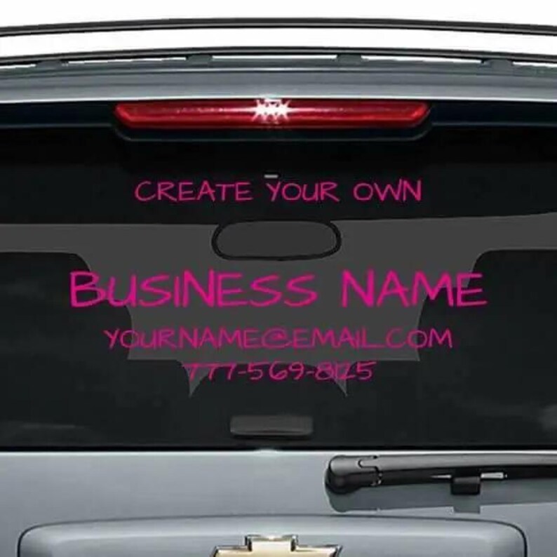 May include: A pink and black car window decal with the text "CREATE YOUR OWN BUSINESS NAME YOURNAME@EMAIL.COM 777-569-8025"