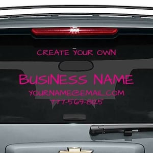 May include: A pink and white car window decal with the text "CREATE YOUR OWN BUSINESS NAME YOURNAME@EMAIL.COM 777-569-8125".