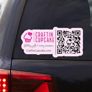 May include: A pink Craftin Cupcake sticker with a cupcake graphic and a QR code. The sticker includes the text "Craftin Cupcake" and "Glittery gifts 4 every occasion" along with the website address CraftinCupcake.com.