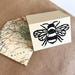If gift wrapping is chosen, this image displays the natural Kraft wrapping paper, handmade card and up cycled envelope included.