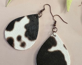 Cow print faux leather earrings