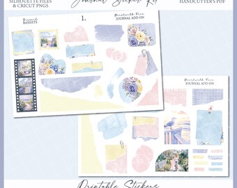 May include: A journal sticker kit with a watercolor theme. The kit includes various stickers with floral, torn paper, and scenic designs in pastel colors. Text includes "Boardwalk Fair" and "Journal Sticker Kit".