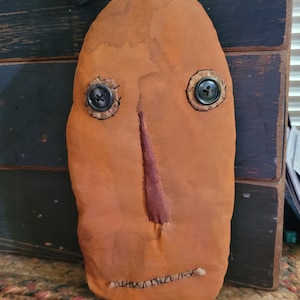 Pumpkin Not Sure is a grunged pumpkin . He, along with his cousin are looking for the  grand pumpkin patch they were expected to be at.