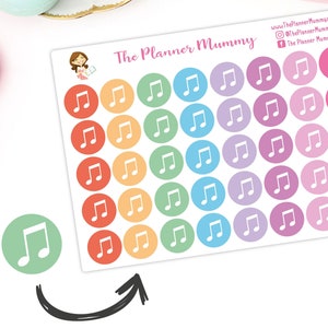 May include: A sheet of colorful round stickers with a white musical note symbol on each sticker. The stickers are arranged in a rainbow pattern. The sheet is labeled "The Planner Mummy".