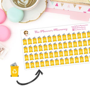 May include: A sheet of yellow recycling bin stickers with a white recycling symbol. The stickers are arranged in a grid pattern and feature a cartoon image of a recycling bin filled with newspapers. The text "The Planner Mummy" is printed at the top of the sheet.
