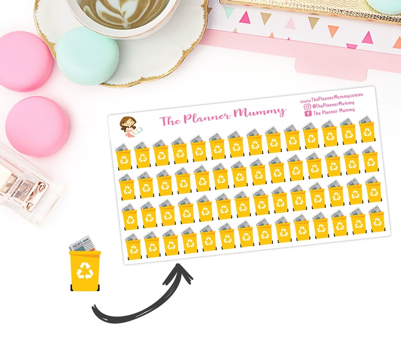 May include: A sheet of yellow recycling bin stickers with a white recycling symbol. The stickers are arranged in a grid pattern and feature a cartoon image of a recycling bin filled with newspapers. The text "The Planner Mummy" is printed at the top of the sheet.