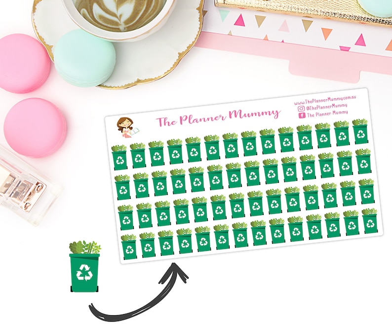May include: A sheet of 72 green recycling bin stickers with a white background. The stickers feature a green recycling bin with a white recycling symbol and green leaves on top. The text "The Planner Mummy" is printed in pink at the top of the sheet.