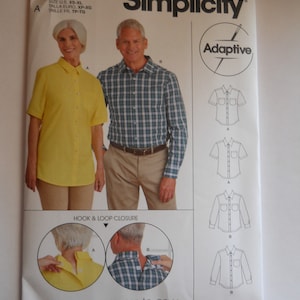 May include: Simplicity sewing pattern number S9487 for a shirt with hook and loop closure. The pattern includes instructions for sizes XS-XL. The pattern is labeled "Adaptive" and "easy-to-sew".