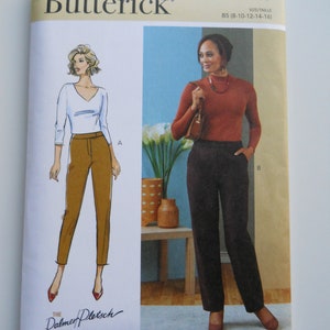 May include: A sewing pattern for pants, featuring two illustrations of women wearing different colored pants. The pattern is from Butterick and is for sizes 8-10-12-14-16. The pattern is called "The Palmer/Pletsch Tissue Fitting Method".