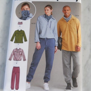 May include: Simplicity sewing pattern number S9278 for sizes L-XXL. The pattern includes instructions for making a long-sleeved shirt with a collar and a pair of sweatpants. The pattern is shown on two models, one wearing a blue shirt and blue sweatpants, and the other wearing a yellow shirt and gray sweatpants.