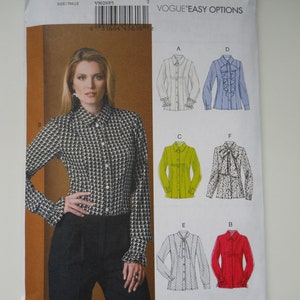 May include: A sewing pattern for a blouse with different sleeve and collar options. The pattern is for sizes 16-18-20-22-24. The pattern is called Vogue Easy Options and the pattern number is V9029.