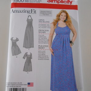 May include: Simplicity Amazing Fit dressmaking pattern. The package features a blue and red floral print dress with an open neckline, princess seams, and a pleated skirt. The pattern includes sizes 20W-28W.