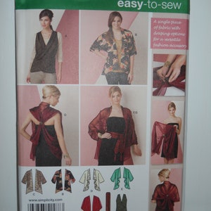 May include: A sewing pattern for a versatile fashion accessory. The pattern includes instructions for making a shawl, a vest, and a wrap. The pattern is for sizes XS-XXL. The pattern is from Simplicity and is easy to sew.