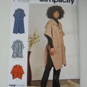 May include: Simplicity sewing pattern S9649 featuring a hooded cape with pockets. The pattern includes sizes S-XXL. The image shows a woman wearing a tan cape. The pattern also shows illustrations of a blue, gray, and orange cape.