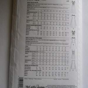 May include: McCall's pattern R11423 for misses' dresses and a top. The pattern includes instructions and measurements for sizes 6-24. The pattern is for easy sewing and includes a variety of fabrics and styles.