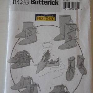 May include: A Butterick sewing pattern, B5233, featuring illustrations of various historical footwear styles. The pattern includes boots, shoes, and ankle boots with details like fringe, ties, and buckles. The "Making History" logo is visible.