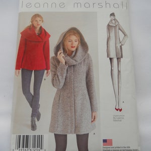 May include: Simplicity sewing pattern number 1254 R5 for a hooded coat with a cowl neck. The pattern is designed by Leanne Marshall and includes two views: a long hooded coat and a shorter, fitted coat with a cowl neck.