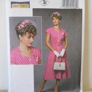 May include: A vintage sewing pattern for a pink polka dot dress with a white collar and buttons. The pattern is from Butterick and is for sizes 14-16-18-20-22. The pattern includes instructions for making a hat and a purse.