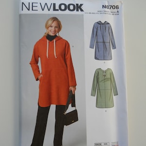 May include: Sewing pattern for a hooded tunic dress with long sleeves. The pattern is for sizes XS-XXL and includes instructions for making three different versions of the dress. The pattern is from Newlook and has the number N6706.