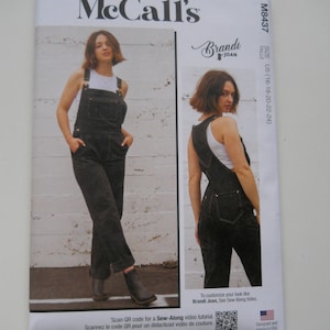 May include: McCall's sewing pattern for a Brandi Joan jumpsuit. The pattern is for sizes US 16-18-20-22-24. The pattern shows a woman wearing a black denim jumpsuit with a white tank top underneath. The pattern includes a QR code to scan for a sew-along video tutorial.