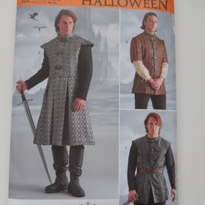 May include: Simplicity Halloween sewing pattern R11600 for sizes US 38-44, Euro 48-54, and French 48-54. The pattern includes three different costume designs: a long, grey, medieval-style tunic with a vest, a brown tunic with a vest, and a grey vest with a long-sleeved shirt. The pattern is designed and printed in the USA.