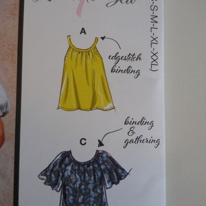 May include: A sewing pattern guide with illustrations of two tops. The first top is yellow and has an edgestitch binding. The second top is blue and white with a floral print and has binding and gathering.
