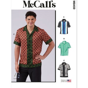 May include: A sewing pattern for a short-sleeved shirt with a collar. The pattern includes four different shirt designs: a striped shirt, a solid green shirt, a black and white patterned shirt, and a red and green patterned shirt. The pattern is from McCall's and the pattern number is M8459.