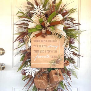 Favorite Things Christmas Swag for Front Door, Sound of Music Christmas Decor, Norfolk Pine Teardrop Wreath with Brown Paper Packages Sign