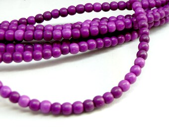 HG106402O 1 fil de 110 perles Turquoise reconstituée Howlite couleur Violet 4mm