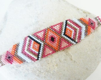 Cuff bracelet weaved ethnic Indian, red pink orange