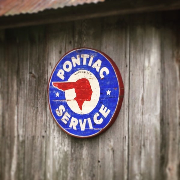 Rustic pontiac service sign round