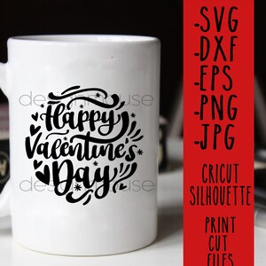 May include: White ceramic mug with a black graphic that says "Happy Valentine's Day" in a stylized font. The mug has a black handle.