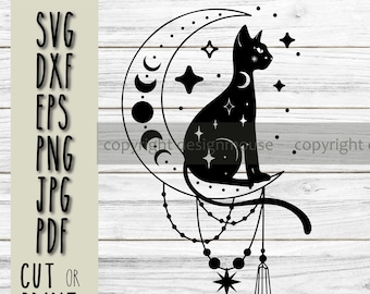 May include: Black silhouette of a cat sitting on a crescent moon with stars and a crystal pendant hanging from the bottom. The design is on a white wood background.