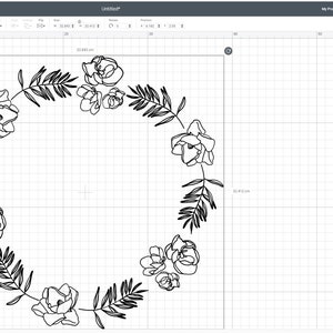 May include: A black and white line drawing of a floral wreath with leaves and flowers. The wreath is circular and has a simple, elegant design.