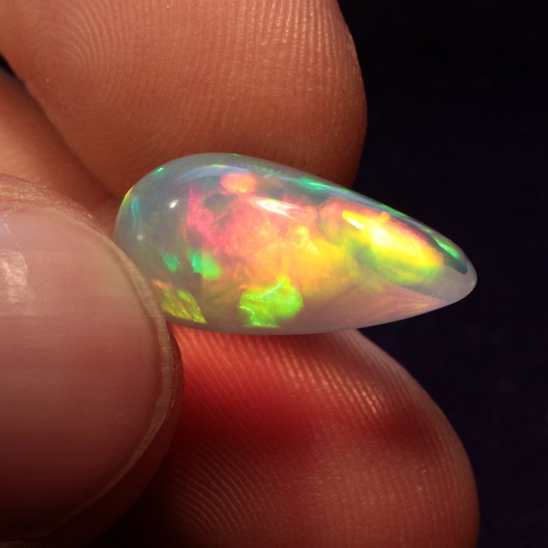 Ethiopian Welo purple crystal opal cabochon with mix pattern