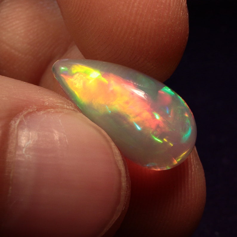 Ethiopian Welo purple crystal opal cabochon with mix pattern