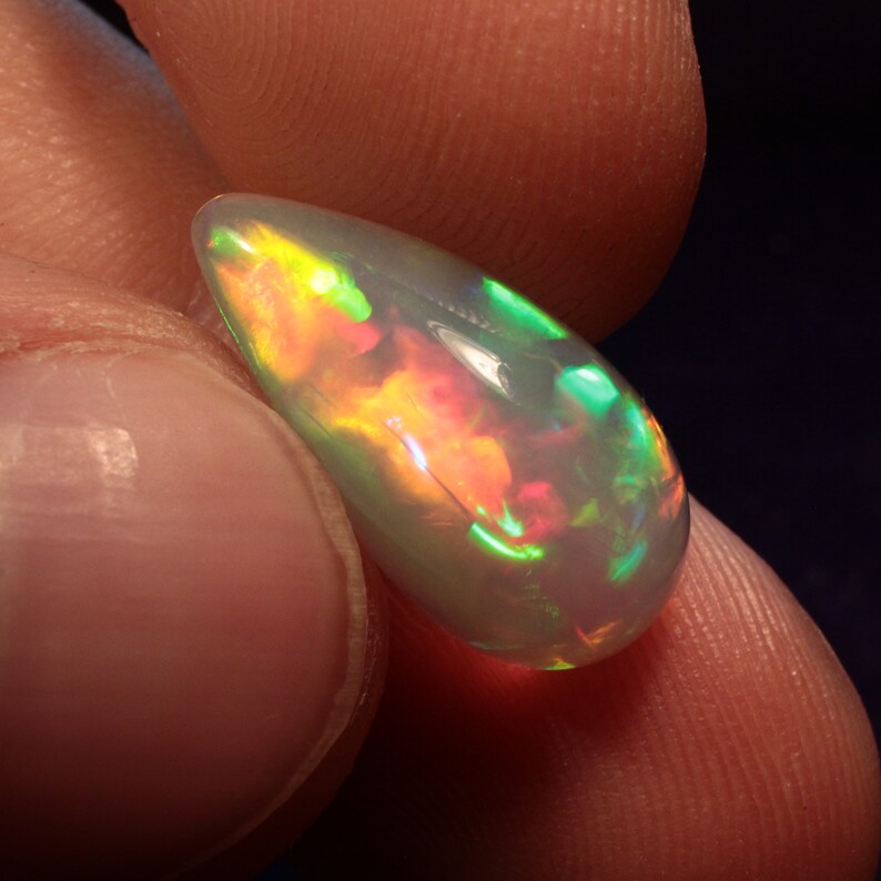 Ethiopian Welo purple crystal opal cabochon with mix pattern