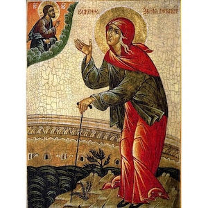 May include: An icon depicting a woman in a red robe and green cloak, holding a staff, with a smaller icon of a man in the top left corner. The text "ΒΙΚΕΝΙΑ" is above the woman and "ΖΕΦΙΑ ΠΕΤΡΑΚΙΤ" is above the man.
